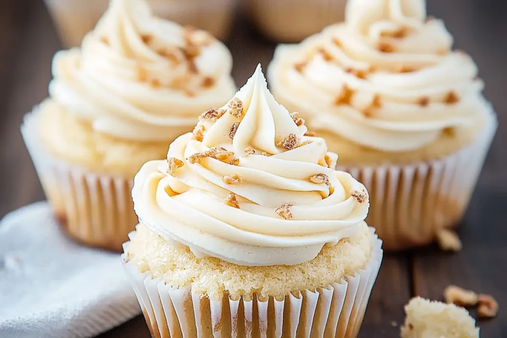 Fluffy whipped cream frosting on a cake.