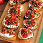 Tomato Basil Bruschetta topped with fresh ingredients on toasted bread.